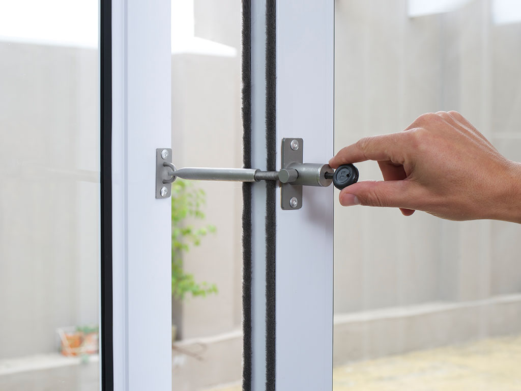 Locking patio glass door open with LockLatch
